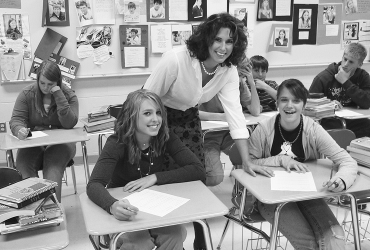 Wisconsin English teacher Deena Neumann with students in her 9th grade classroom